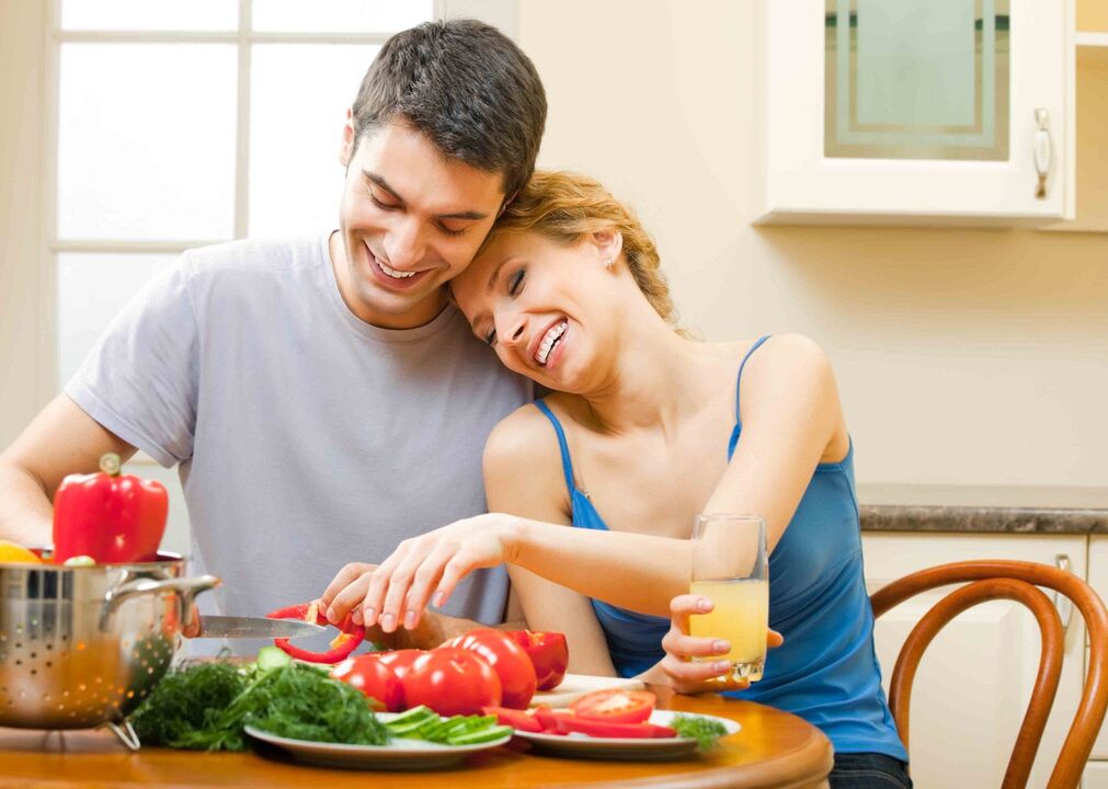 couple preparing vegetables to increase male potency