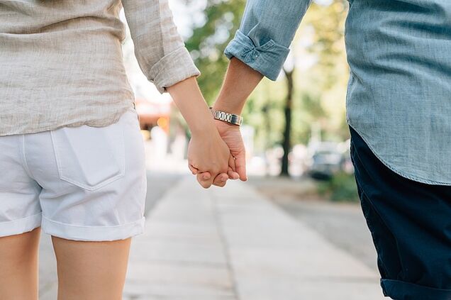 A man without potency problems takes a woman's hand.